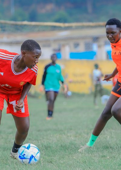 a player dribbling past a defender