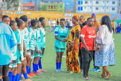 the Dibril FC team lined up before a match